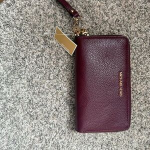Michael Kors Dark Red Wristlet with Gold Accents